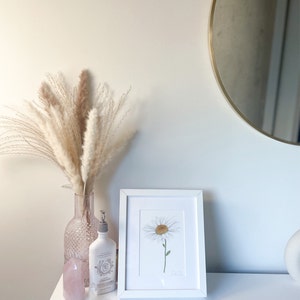 Alexandra added a photo of their purchase