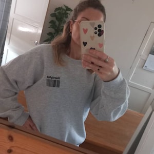 Mrs added a photo of their purchase