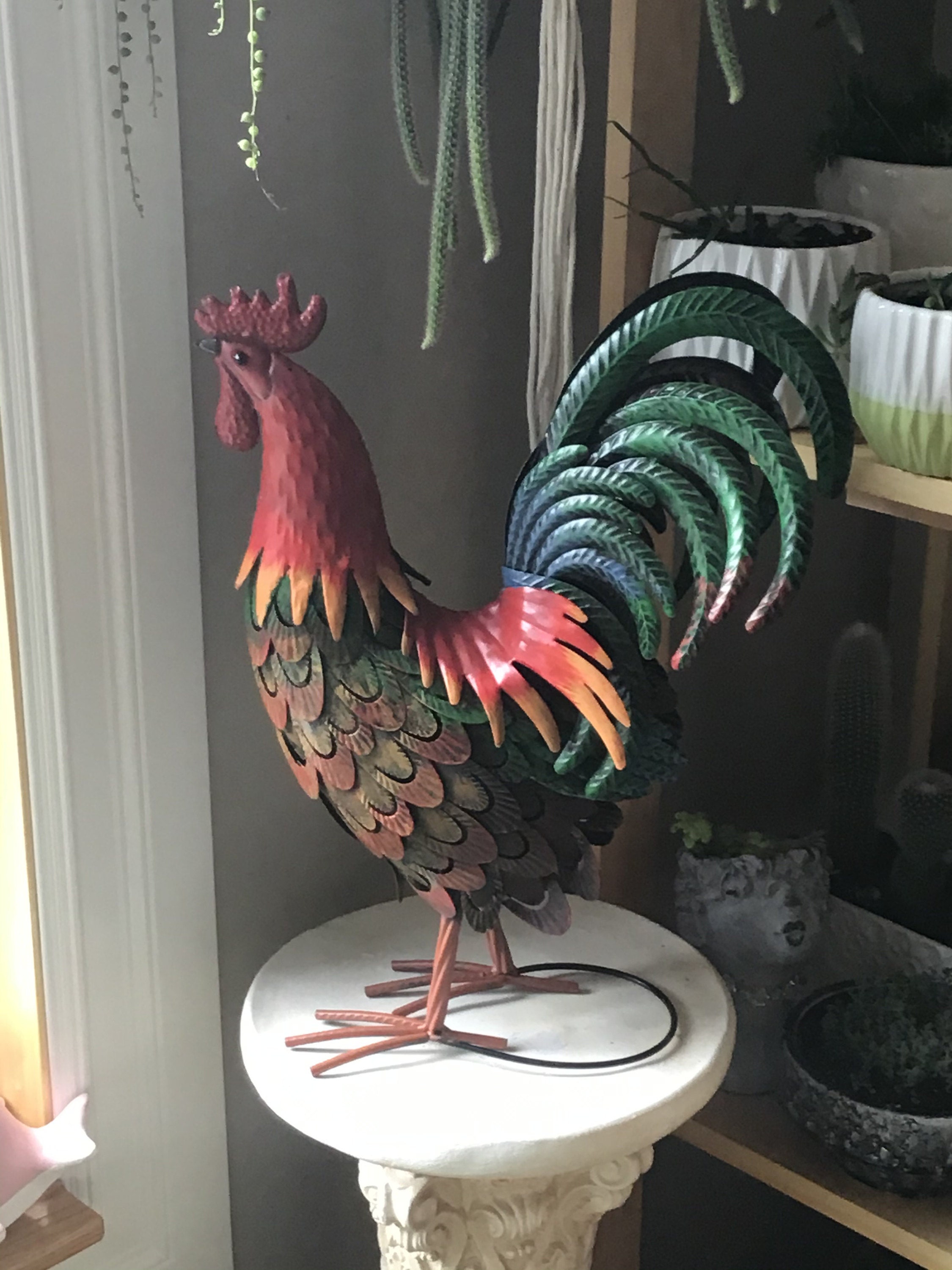 large metal chicken statue
