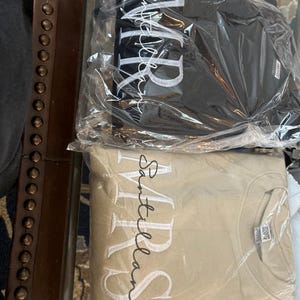 Emily added a photo of their purchase