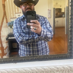 Christopher added a photo of their purchase