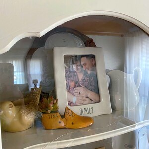 Sarah added a photo of their purchase