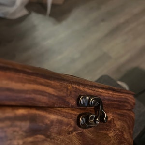 Emi added a photo of their purchase