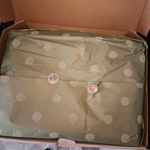 Sandra added a photo of their purchase