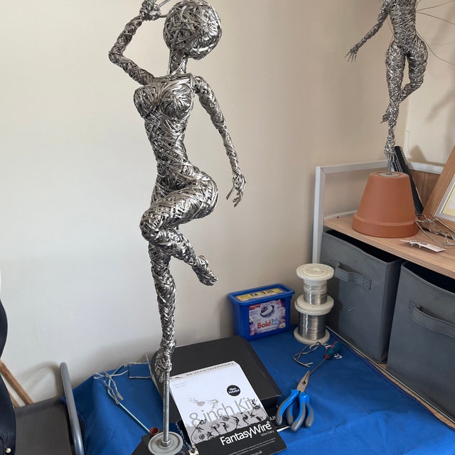 Just finished my first sculpture with armature wire. It's far from