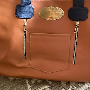 Roxanne added a photo of their purchase
