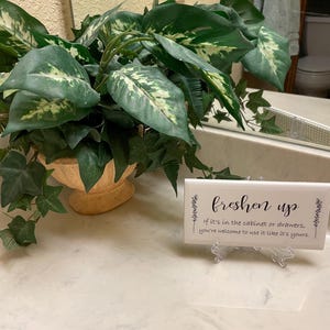 Donna added a photo of their purchase