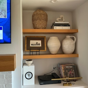 Gina added a photo of their purchase