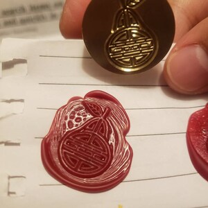 Juniar C Tjoeng added a photo of their purchase