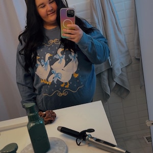 Kyra added a photo of their purchase