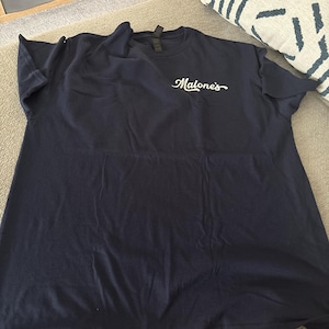 Lizzie added a photo of their purchase