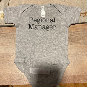 Assistant to the Regional Manager Shirt and Regional Manager Bodysuit ...