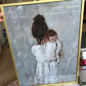 Laura added a photo of their purchase