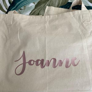 Joanne added a photo of their purchase