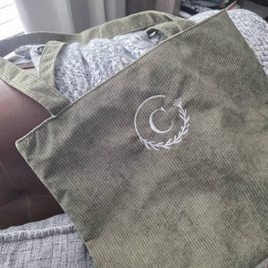 Cheryl added a photo of their purchase