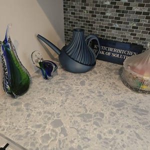 Janet added a photo of their purchase