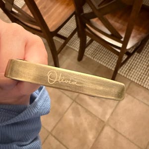 Olivia added a photo of their purchase