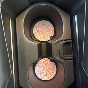 Adriana added a photo of their purchase