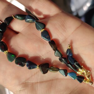 天然エチオピア産ブラックオパールブレスレット 7×5mm 16石 K18WGGP 7 x 5 MM 天然エチオピアンウェロブラックオパールブレスレット