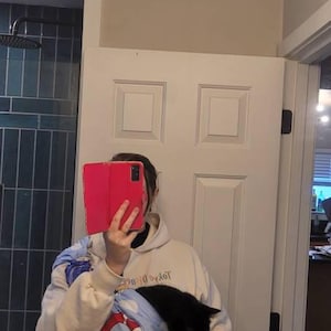 Alex added a photo of their purchase