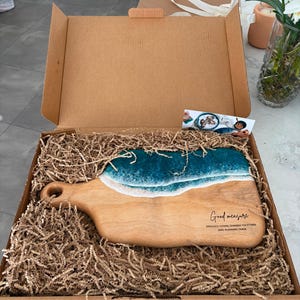 Immanuel added a photo of their purchase