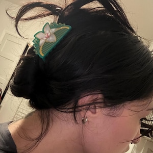 Naomi added a photo of their purchase