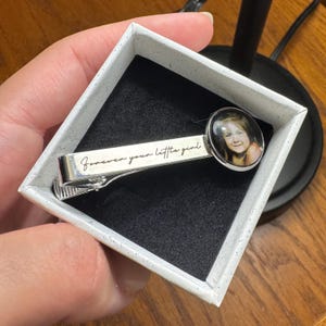 Katrina added a photo of their purchase