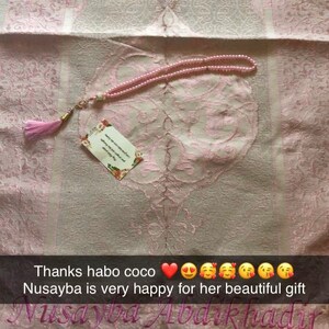 Naima added a photo of their purchase