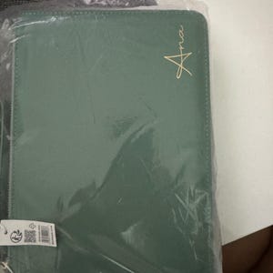Hilary added a photo of their purchase