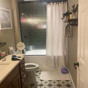 Laura added a photo of their purchase