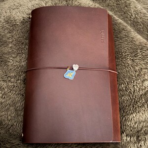 Sarah added a photo of their purchase