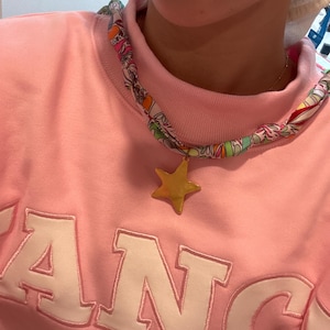 Emma added a photo of their purchase