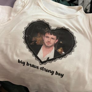 Caitlin added a photo of their purchase