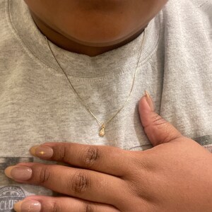 Naomi added a photo of their purchase