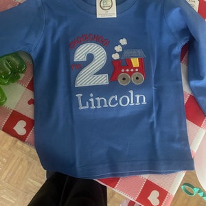 Katie added a photo of their purchase