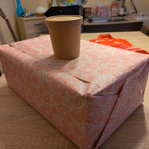 Miriam added a photo of their purchase