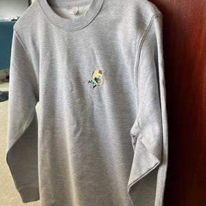 Lewis added a photo of their purchase