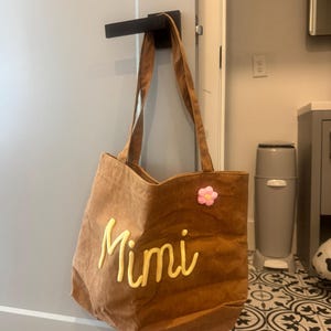 Kayla added a photo of their purchase