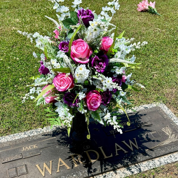 Pink and Yellow. Ranunculus, and Roses Grave Flower Arrangement ...