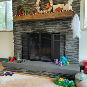 DIY Stone Fireplace Bumper #Babyproofing