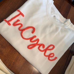 SARAH added a photo of their purchase