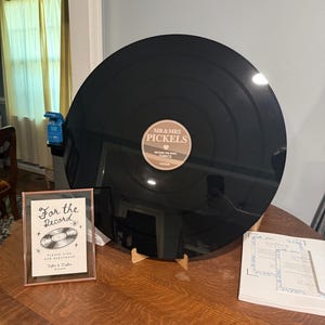 Taylor added a photo of their purchase