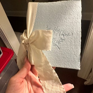 Kimberley added a photo of their purchase