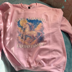 Laura added a photo of their purchase