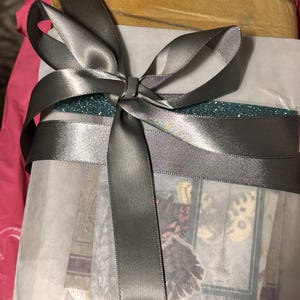 Della added a photo of their purchase