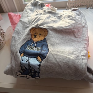 Alison added a photo of their purchase