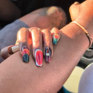 Jamila added a photo of their purchase