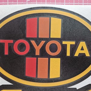SVG File: Vintage Toyota Oval Emblem - SVG Graphic for Cricut or