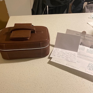 Gloria added a photo of their purchase