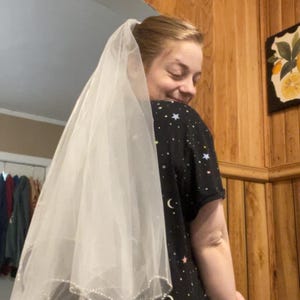 Sarah added a photo of their purchase